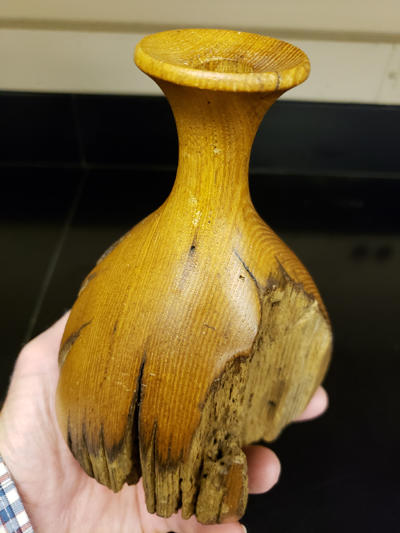 This vase was made from a 150+ year old Chestnut wood fence post used at a homestead in West Virginia.