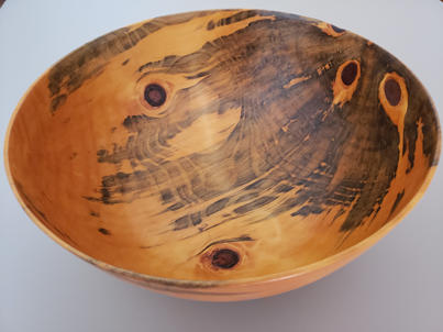 Bowl made from blue stained pine wood.